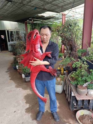 comprar O fantoche realístico Animatronic do bebê do dinossauro do controle da mão personalizou online manufacture